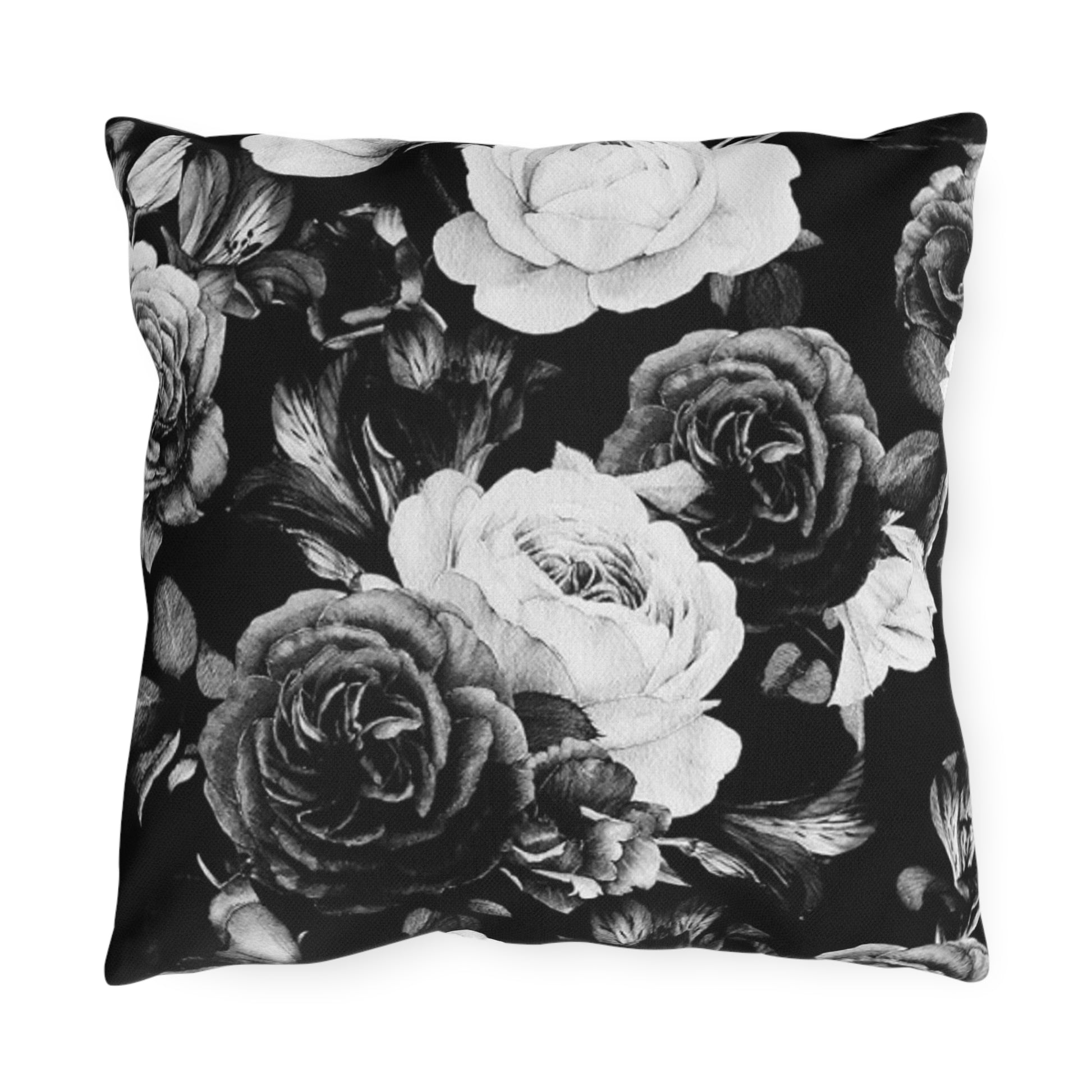 Black and white floral outdoor pillow with elegant pattern, perfect for patios and outdoor decor