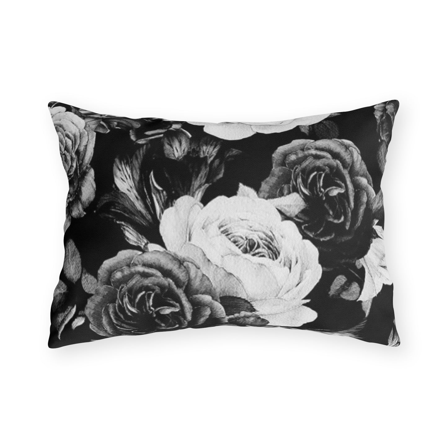 Black and white floral outdoor pillow with elegant pattern, perfect for patios and outdoor decor